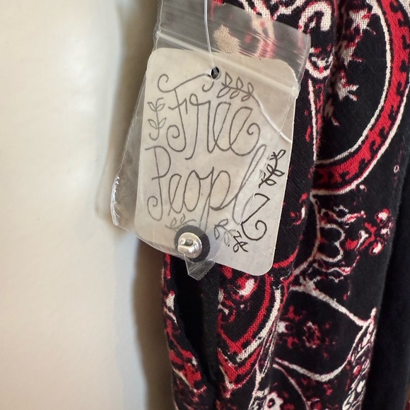 NWT Free People Setting Sun Black Print Deep V-Neck Romper in Size Small - Picture 8 of 13